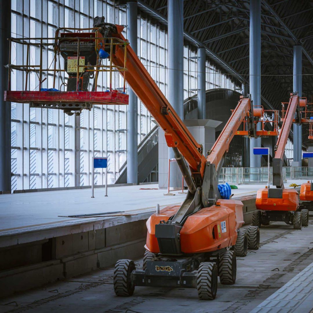 telescopic boom lift being used indoors